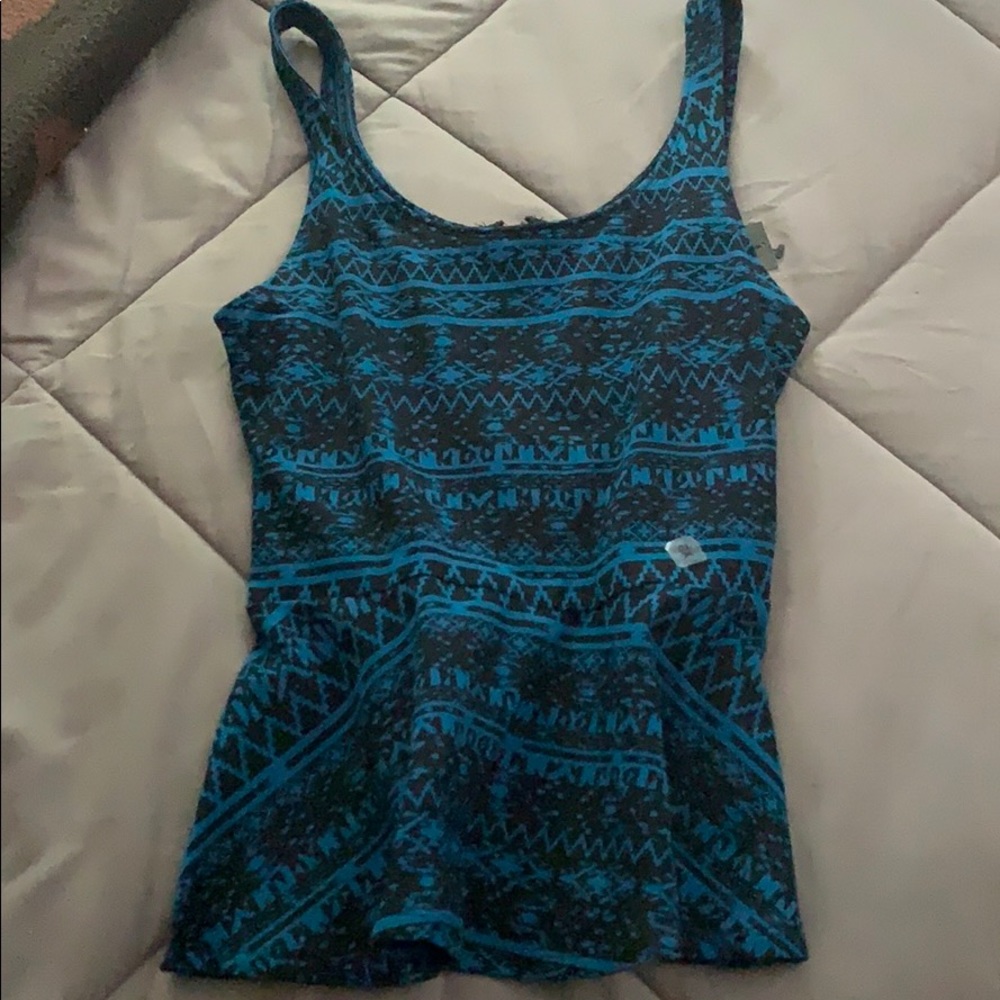 Express blue and black peplum top, zipper on back
